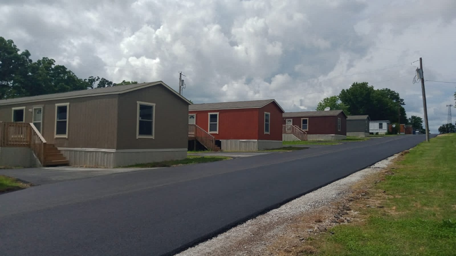 a row of houses on the side of a road